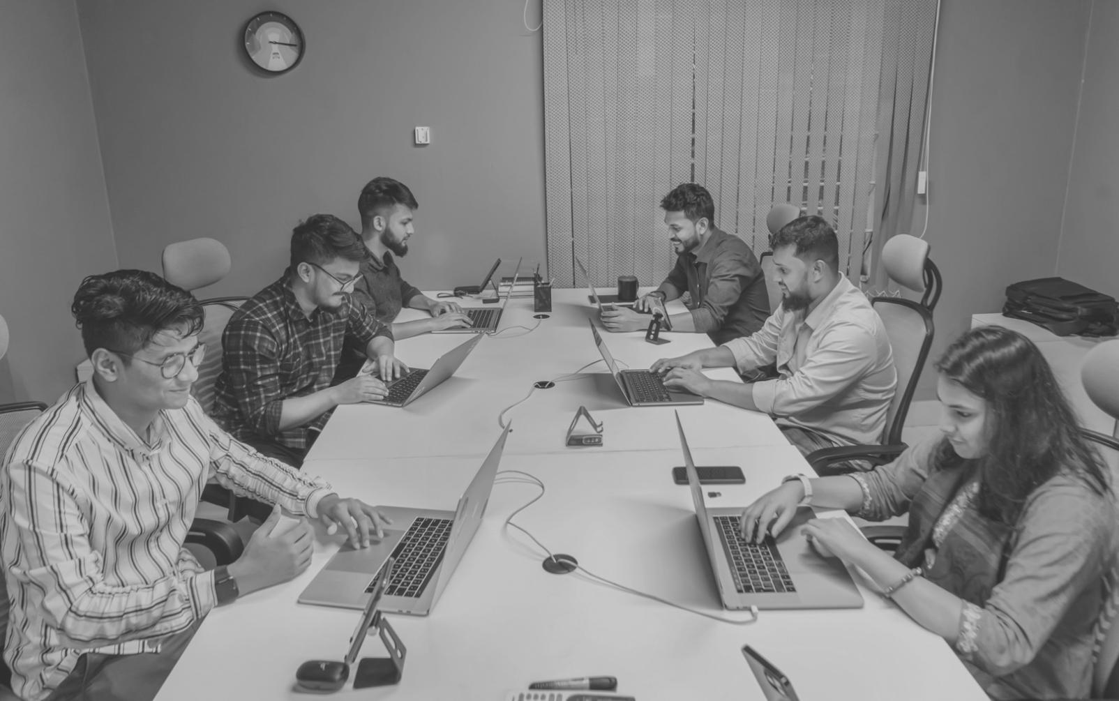 Technical support team analyzing mobile app performance